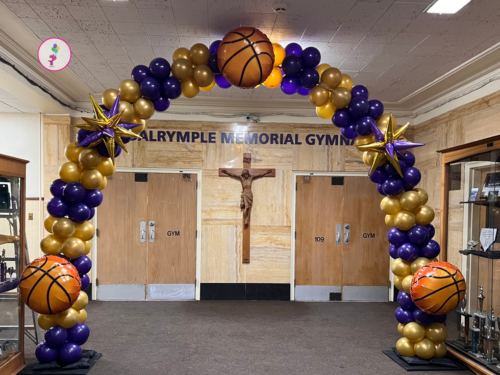 Basketball balloon arch with purple and gold balloons at gym entrance, Saratoga Springs NY