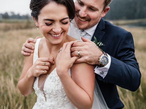 Bride and groom taking photos at haycroft farm