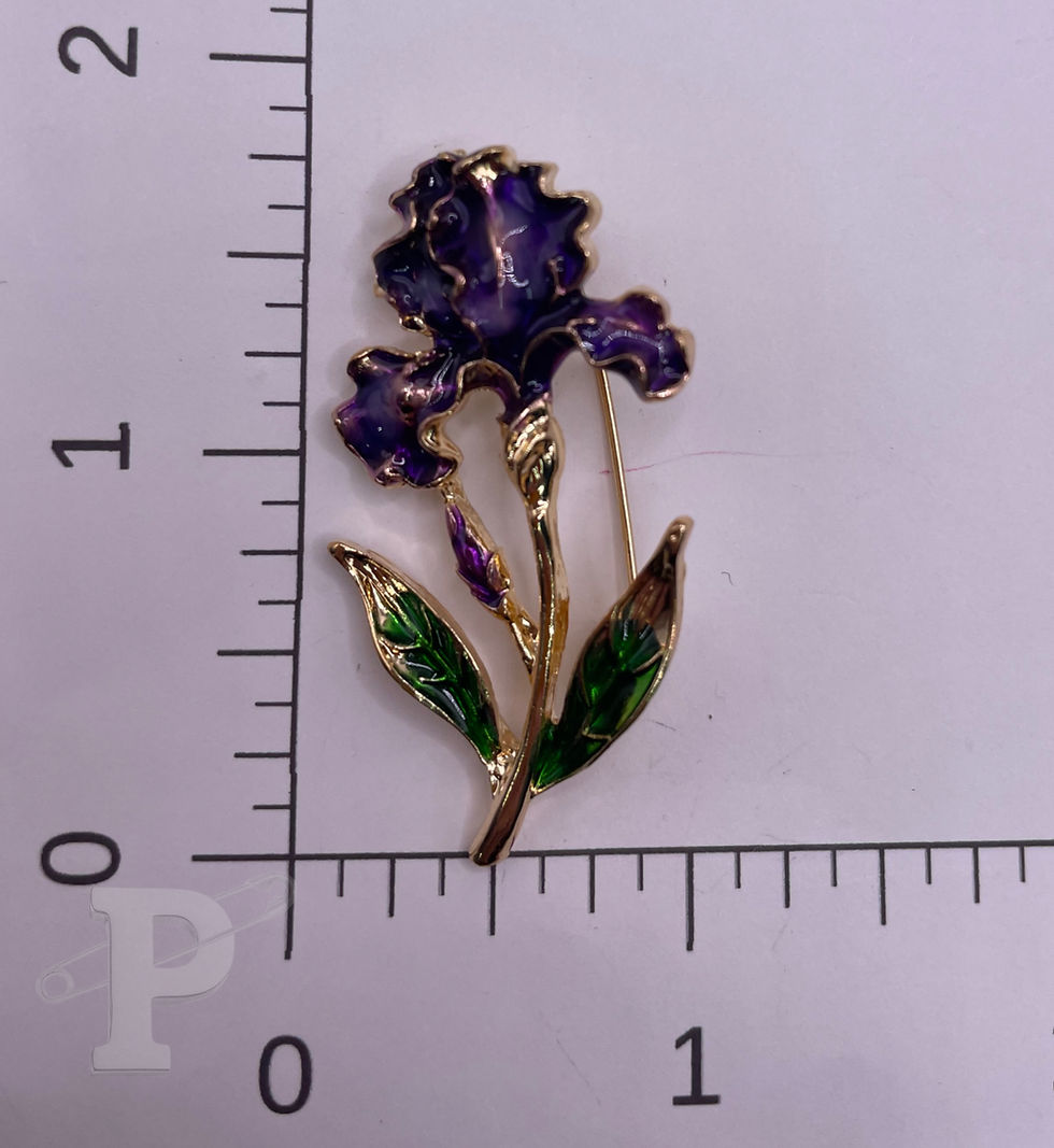 Thumbnail: Iris flower brooch shown with ruler for size reference.