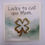 Thumbnail: mini card that reads lucky to call you mom with gold four leaf clover brooch