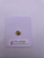 The back of a flat card showing  metal clutch back of pin from Pin and Paper