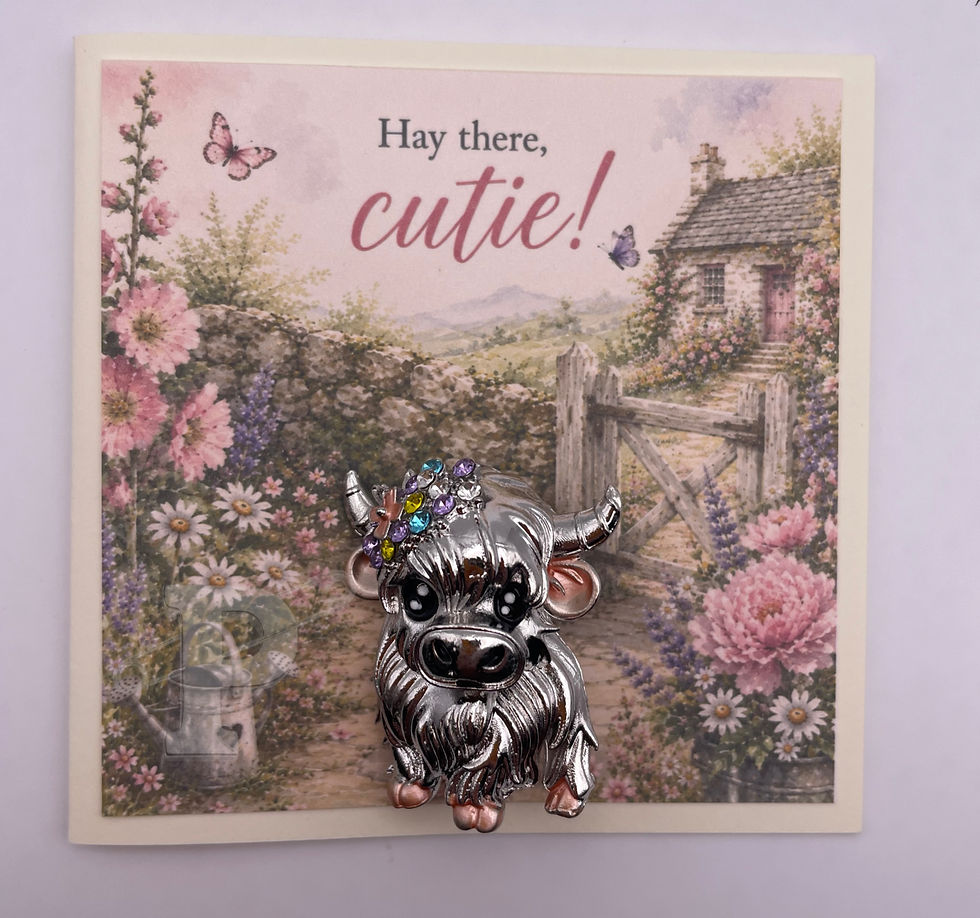 Mini greeting card with Highland cow enamel brooch and the sentiment, "Hay there, cutie!"