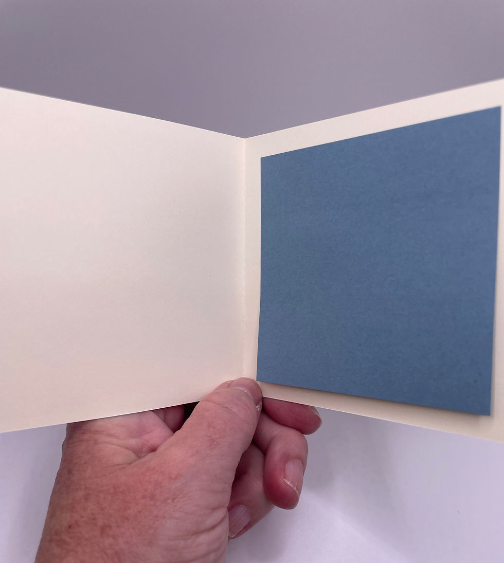 Blank cream-colored interior with a blue color-coordinated writing panel.