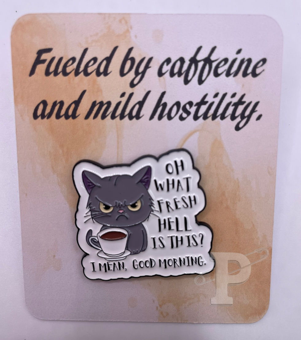 Flat card that reads “Fueled by caffeine and mild hostility" with pin “Oh what fresh hell is this? I mean, good morning”
