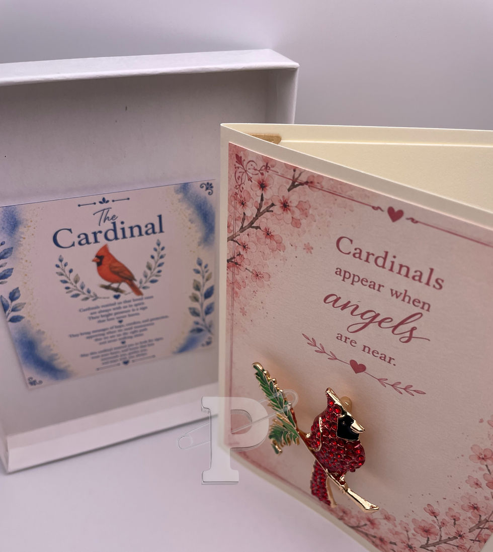 Gift-boxed cardinal sympathy card with removable cardinal brooch and Cardinal Symbol Meaning Card inside.
