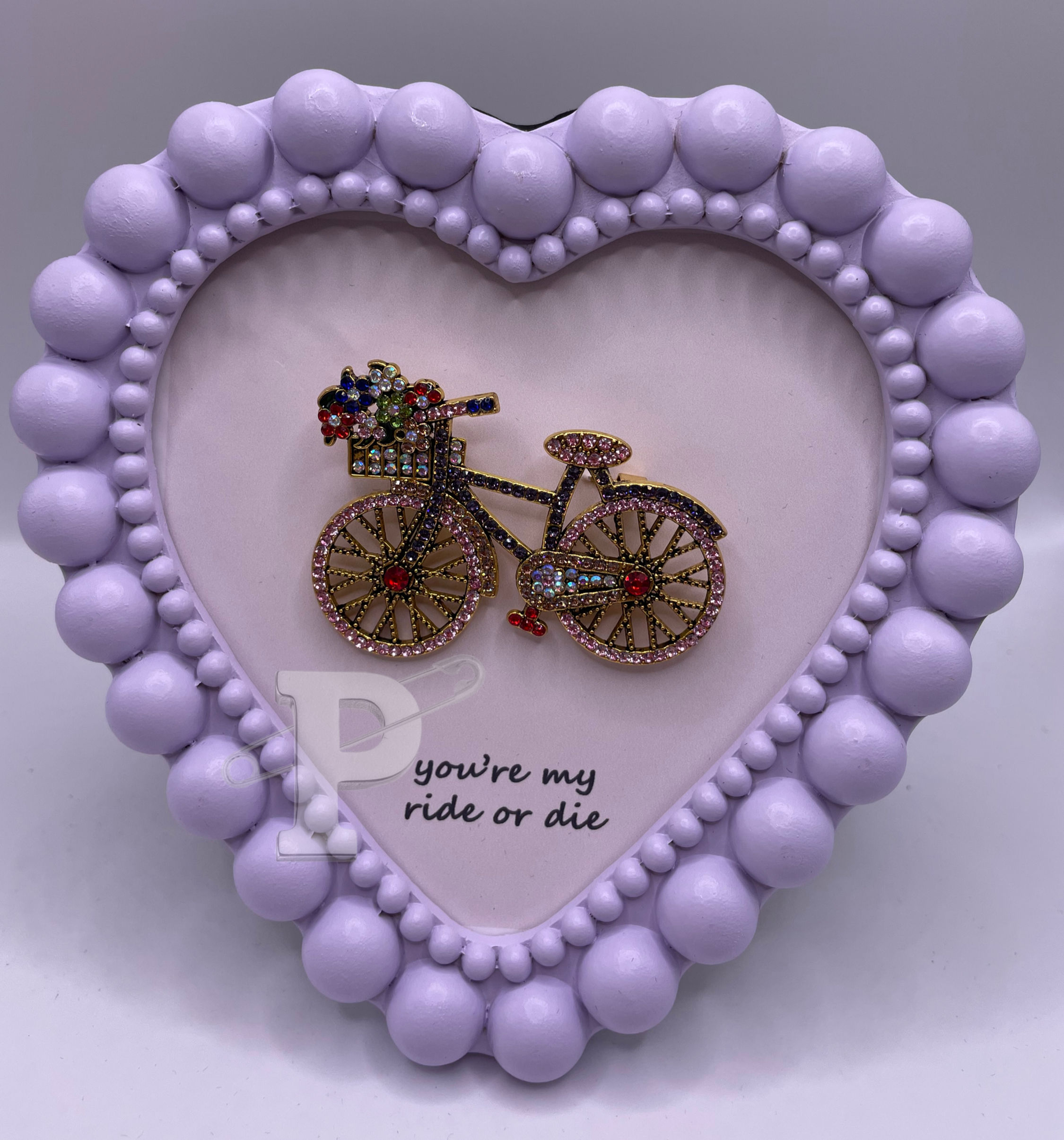 lavender heart tabletop frame with jeweled bicycle brooch and youre my ride or die sentiment