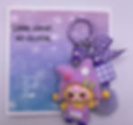 Mini card that reads “Sending support, not solutions.” with a purple flocked bunny keychain.