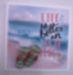 Mini card that reads “Life is better in flip flops” with blue and pink rhinestone flip flop brooch
