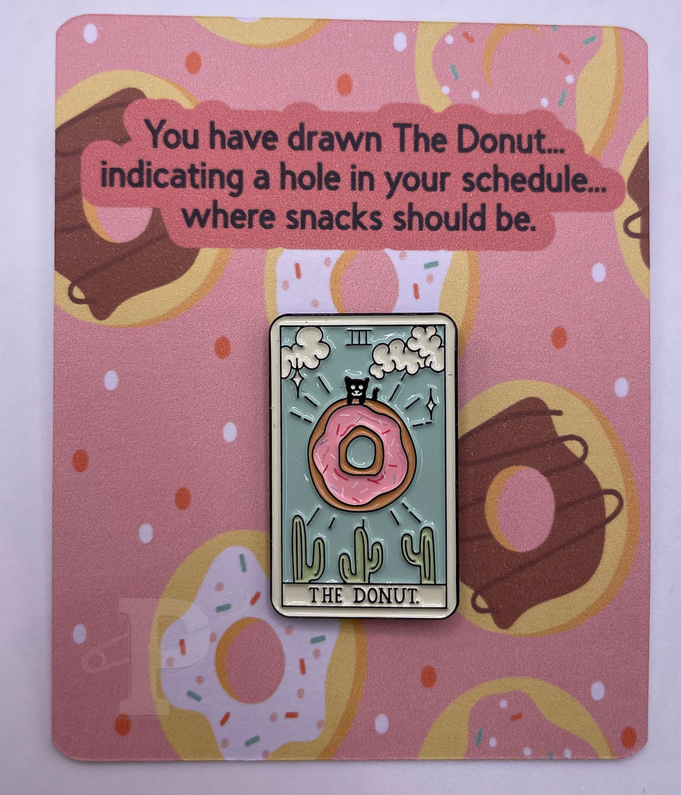 Flat card that reads “You have drawn The Donut…” with donut tarot enamel pin attached.