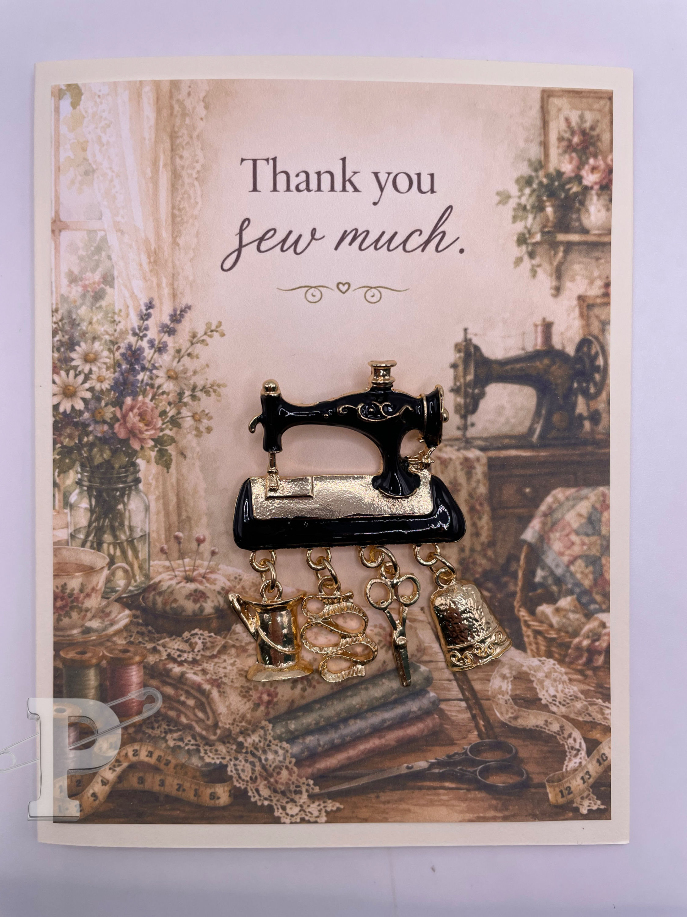 Vintage sewing machine brooch on thank you card for sewist.