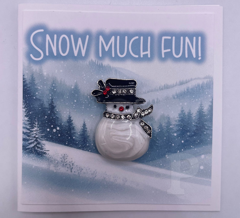 Mini card with snowman brooch attached that reads "Snow much fun"