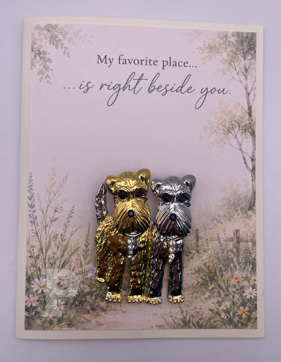 Gift-boxed love card featuring a two-dog brooch with the sentiment: "My favorite place... ...is right beside you."