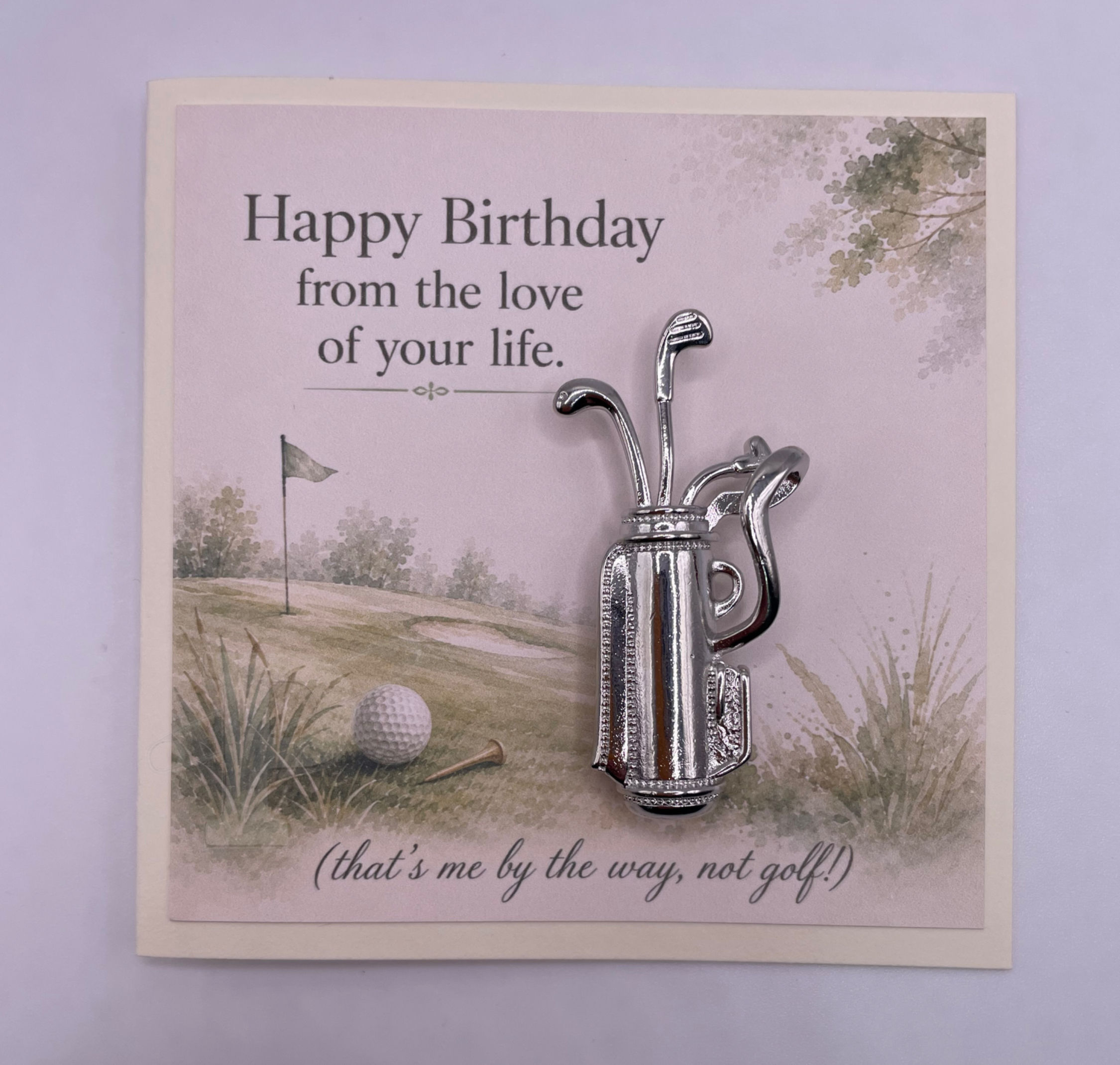 Funny golf birthday mini card with silver golf bag brooch and watercolor golf course.