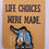 Thumbnail: flat card that reads ‘life choices were made’ with enamel pin that says ‘i live in a van down by the river’