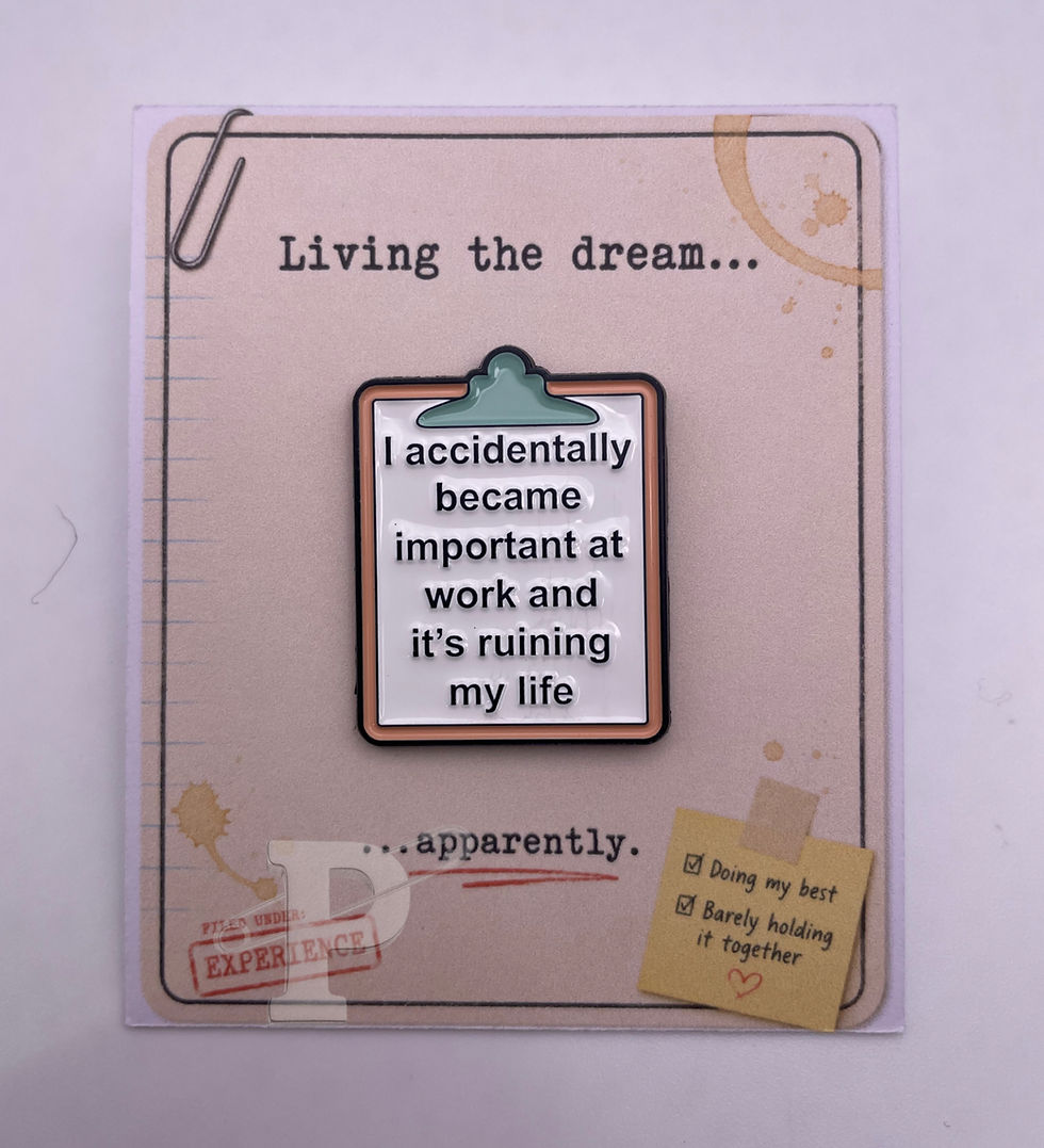 Funny office clipboard enamel pin on a vintage file folder-inspired pin card with the sentiment "Living the dream... apparent