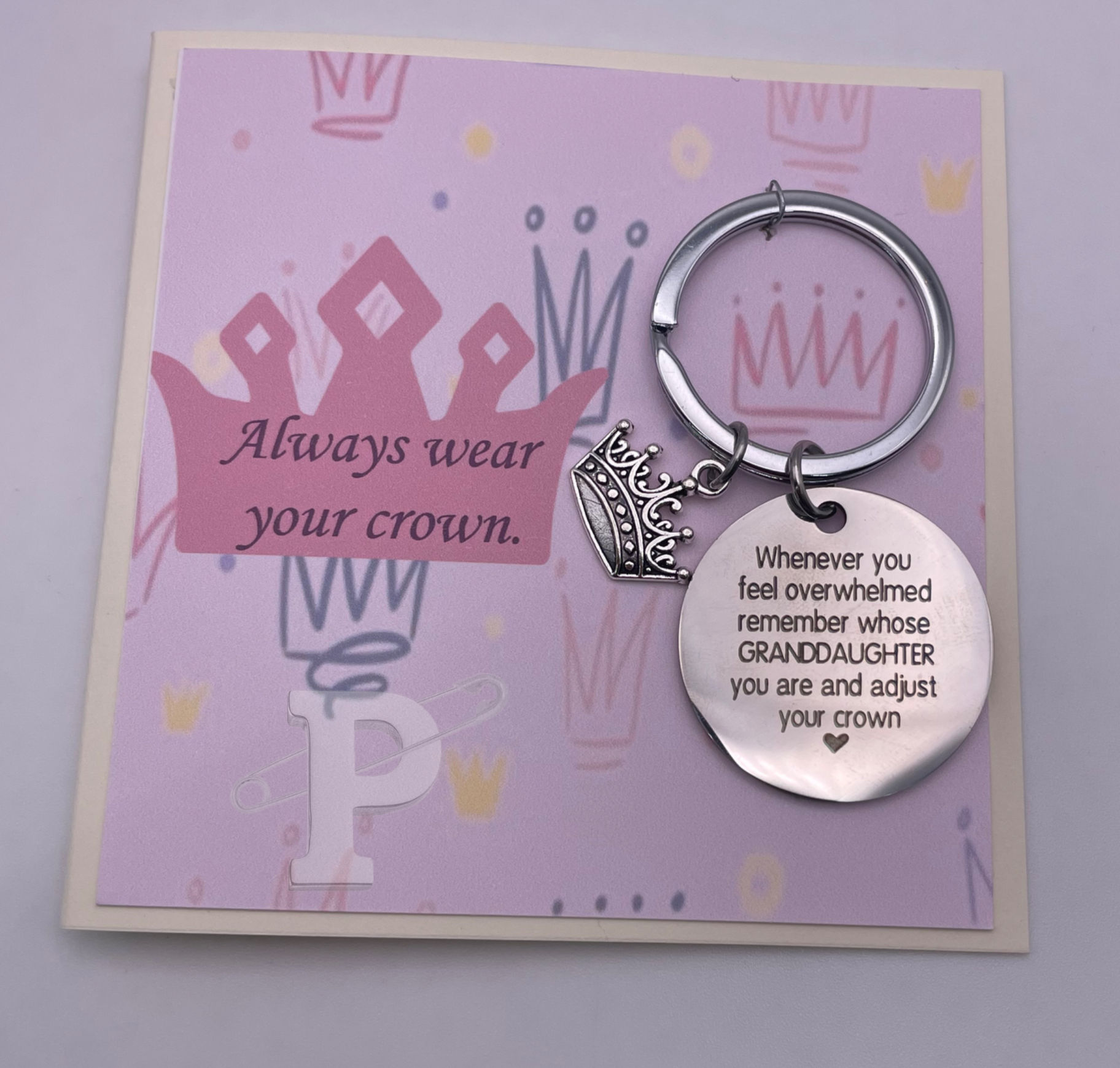 Mini greeting card that reads “Always wear your crown.” with granddaughter crown keychain.