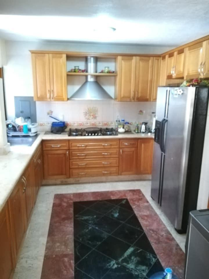 HERMOSA RESIDENCIA ESTILO RÚSTICO-CONTEMPORÁNEO CON LUJOSOS ACABADOS; EXCELENTE PARA DISFRUTARLA CON TU FAMILIA; UBICADA EN EL CENTRO DE ZIHUATANEJO A 5 MINUTOS DE LOS PRINCIPALES CENTROS DE COMERCIO, ZONA BANCARIA Y PLAYAS.
PRIMER PLANTA:
CASA PRINCIPAL CONSTA DE: SALA, COMEDOR, COCINA EQUIPADA, JARDÍN INTERIOR CON VITRALES, 2 BAÑOS, 3 RECÁMARAS TODAS CON AIRE ACONDICIONADO, CLOSETS DE MADERA DE CEDRO.
• RECAMARA PRINCIPAL CON BAÑO, VESTÍBULO Y JACUZZI, CON ACCESO DIRECTO A LA ALBERCA Y SALA DE ESTAR.
• SEGUNDA RECAMARA Y TERCER RECAMARA COMPARTEN BAÑO, TODOS LOS BAÑOS CON CANCELARÍA DE CRISTAL TEMPLADO, ESTUDIO, 1/2 BAÑO DE VISITA, PISOS DE MÁRMOL. GARAJE PARA 2 AUTOS, CISTERNA CON CAPACIDAD DE 25,000 LTS.
• ALBERCA CON BAÑO, VESTIDOR Y CUARTO DE BOMBAS DE FILTRADO,
• CUARTO DE SERVICIO CON ESPACIO PARA LAVADORA Y SECADORA
• CISTERNA CON CAPACIDAD DE 10,000 LTS.
• CÁMARAS DE CIRCUITO CERRADO PARA VÍDEO VIGILANCIA, PERÍMETRO PROTEGIDO, BARDEADO, ENREJADO Y CIRCULADO CON CONCERTINA TIPO BISTURÍ
• PORTÓN DE ACCESO Y PUERTA DE PLACA DE ACERO TIPO BLINDAJE CON APERTURA DE PORTÓN AUTOMATIZADO Y PUERTA CON VIDEO PORTERO Y APERTURA AUTOMÁTICA.
• LOCAL COMERCIAL CON ACCESO DE LA CALLE, EQUIPADO PARA OFICINA CON DIVISIONES DE CRISTAL TEMPLADO E ILUMINACIÓN EN LEDS, AIRE ACONDICIONADO TIPO MINI SPLIT, BAÑO Y ACCESO DE PUERTA DE CRISTAL TEMPLADO AUTOMATIZADO,PISOS DE MÁRMOL CON PARED DE MADERA DE PAROTA.
• SEGUNDA PLANTA: UN DEPARTAMENTO TIPO BUNGALOW, TOTALMENTE CON ENTRADA INDEPENDIENTE CON ACABADOS EN MÁRMOL Y MADERAS PRECIOSAS E ILUMINACIÓN DE LEDS. 2 RECAMARAS CON AIRE ACONDICIONADO TIPO MINI SPLIT Y PANTALLAS LCD CON CABLE; UNA CON CAMA KING SIZE Y LA OTRA CON 2 CAMAS INDIVIDUALES, TODAS CON CLOSETS DE MADERA DE CEDRO. COCINA CON BARRA. SALA DE ESTAR CON SISTEMA DE SONIDO, LUCES LED´S DE AMBIENTACIÓN. JARDÍN CON ESPACIOSA CABAÑA CONSTRUIDA CON MADERAS PRECIOSAS CON ESPACIO PARA 4 HAMACAS.
●CONSTA DE 319.08 MTS 2. DE TERRENO
●CONSTA DE 301.84 MTS 2 DE CONSTRUCCIÓN.
● INCLUYE MOBILIARIO EXCEPTO EL ARTE.
____________________
BEAUTIFUL CONTEMPORARY-RUSTIC STYLE RESIDENCE WITH LUXURY FINISHES; EXCELLENT TO ENJOY WITH YOUR FAMILY; LOCATED IN TOWN OF ZIHUATANEJO, GUERRERO MÉXICO, 5 MINUTES FROM THE MAIN CENTERS OF COMMERCE, BANK AREA AND BEACHES.
FIRST FLOOR:
MAIN HOUSE CONSISTS: LIVING ROOM, DINING ROOM, EQUIPPED KITCHEN, INTERIOR GARDEN WITH VITRALS, 2 BATHROOMS, 3 BEDROOMS ALL WITH AIR CONDITIONING, CEDRO WOOD CLOSETS.
MAIN BEDROOM WITH BATH, DRESSING ROOM AND JACUZZI, WITH DIRECT ACCESS TO THE POOL AND LIVING ROOM.
SECOND BEDROOM AND THIRD BEDROOM SHARE BATHROOM, ALL BATHROOMS WITH TEMPERED GLASS CANCELLATION, STUDY, 1/2 VISIT BATH, MARBLE FLOORS. GARAGE FOR 2 CARS, 1 TANK WITH CAPACITY OF 25,000 LTS
POOL WITH BATHROOM, DRESSING ROOM AND FILTER PUMPS
SERVICE ROOM WITH SPACE FOR WASHING AND DRYER AND TANK WITH CAPACITY OF 10,000 LTS.
CLOSED CIRCUIT CAMERAS FOR VIDEO SURVEILLANCE, PROTECTED PERIMETER, BARRIED AND CRIEDED CIRCULATE WITH SCALPEL TYPE CONCERTINE, ACCESS GATE AND STEEL PLATE DOOR ARMOR TYPE WITH AUTOMATIC AUTOMATED AND DOOR OPENED DOOR OPENING.
COMMERCIAL PREMISES WITH STREET ACCESS, EQUIPPED FOR OFFICE WITH TEMPERED GLASS DIVISIONS AND LIGHTING IN LEDS, MINI SPLIT TYPE AIR CONDITIONING, BATHROOM AND AUTOMATED TEMPERED GLASS DOOR ACCESS, MARBLE FLOORS WITH WOOD WALL.
SECOND FLOOR:
A BUNGALOW TYPE DEPARTMENT, FULLY WITH INDEPENDENT ENTRANCE WITH FINISHES IN MARBLE AND PRECIOUS WOODS AND LED LIGHTING.
2 BEDROOMS WITH AIR CONDITIONING TYPE MINI SPLIT AND LCD SCREENS WITH CABLE; ONE WITH KING SIZE BED AND THE OTHER WITH 2 INDIVIDUAL BEDS, ALL WITH CLOSETS OF WOOD OF CEDAR.
KITCHEN WITH BAR. LIVING ROOM WITH SOUND SYSTEM, LED´S AMBIENTATION LIGHTS. GARDEN WITH SPACIOUS CABIN BUILT WITH PRECIOUS WOODS WITH SPACE FOR 4 HAMMOCKS.
● LAND OF 319.08 MTS 2.
● CONSTRUCTION 301.84 MTS 2
● INCLUDES FURNITURE EXCEPT THE ART.