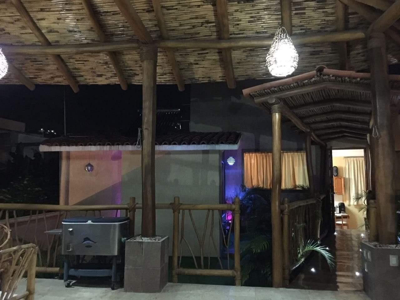 HERMOSA RESIDENCIA ESTILO RÚSTICO-CONTEMPORÁNEO CON LUJOSOS ACABADOS; EXCELENTE PARA DISFRUTARLA CON TU FAMILIA; UBICADA EN EL CENTRO DE ZIHUATANEJO A 5 MINUTOS DE LOS PRINCIPALES CENTROS DE COMERCIO, ZONA BANCARIA Y PLAYAS.
PRIMER PLANTA:
CASA PRINCIPAL CONSTA DE: SALA, COMEDOR, COCINA EQUIPADA, JARDÍN INTERIOR CON VITRALES, 2 BAÑOS, 3 RECÁMARAS TODAS CON AIRE ACONDICIONADO, CLOSETS DE MADERA DE CEDRO.
• RECAMARA PRINCIPAL CON BAÑO, VESTÍBULO Y JACUZZI, CON ACCESO DIRECTO A LA ALBERCA Y SALA DE ESTAR.
• SEGUNDA RECAMARA Y TERCER RECAMARA COMPARTEN BAÑO, TODOS LOS BAÑOS CON CANCELARÍA DE CRISTAL TEMPLADO, ESTUDIO, 1/2 BAÑO DE VISITA, PISOS DE MÁRMOL. GARAJE PARA 2 AUTOS, CISTERNA CON CAPACIDAD DE 25,000 LTS.
• ALBERCA CON BAÑO, VESTIDOR Y CUARTO DE BOMBAS DE FILTRADO,
• CUARTO DE SERVICIO CON ESPACIO PARA LAVADORA Y SECADORA
• CISTERNA CON CAPACIDAD DE 10,000 LTS.
• CÁMARAS DE CIRCUITO CERRADO PARA VÍDEO VIGILANCIA, PERÍMETRO PROTEGIDO, BARDEADO, ENREJADO Y CIRCULADO CON CONCERTINA TIPO BISTURÍ
• PORTÓN DE ACCESO Y PUERTA DE PLACA DE ACERO TIPO BLINDAJE CON APERTURA DE PORTÓN AUTOMATIZADO Y PUERTA CON VIDEO PORTERO Y APERTURA AUTOMÁTICA.
• LOCAL COMERCIAL CON ACCESO DE LA CALLE, EQUIPADO PARA OFICINA CON DIVISIONES DE CRISTAL TEMPLADO E ILUMINACIÓN EN LEDS, AIRE ACONDICIONADO TIPO MINI SPLIT, BAÑO Y ACCESO DE PUERTA DE CRISTAL TEMPLADO AUTOMATIZADO,PISOS DE MÁRMOL CON PARED DE MADERA DE PAROTA.
• SEGUNDA PLANTA: UN DEPARTAMENTO TIPO BUNGALOW, TOTALMENTE CON ENTRADA INDEPENDIENTE CON ACABADOS EN MÁRMOL Y MADERAS PRECIOSAS E ILUMINACIÓN DE LEDS. 2 RECAMARAS CON AIRE ACONDICIONADO TIPO MINI SPLIT Y PANTALLAS LCD CON CABLE; UNA CON CAMA KING SIZE Y LA OTRA CON 2 CAMAS INDIVIDUALES, TODAS CON CLOSETS DE MADERA DE CEDRO. COCINA CON BARRA. SALA DE ESTAR CON SISTEMA DE SONIDO, LUCES LED´S DE AMBIENTACIÓN. JARDÍN CON ESPACIOSA CABAÑA CONSTRUIDA CON MADERAS PRECIOSAS CON ESPACIO PARA 4 HAMACAS.
●CONSTA DE 319.08 MTS 2. DE TERRENO
●CONSTA DE 301.84 MTS 2 DE CONSTRUCCIÓN.
● INCLUYE MOBILIARIO EXCEPTO EL ARTE.
____________________
BEAUTIFUL CONTEMPORARY-RUSTIC STYLE RESIDENCE WITH LUXURY FINISHES; EXCELLENT TO ENJOY WITH YOUR FAMILY; LOCATED IN TOWN OF ZIHUATANEJO, GUERRERO MÉXICO, 5 MINUTES FROM THE MAIN CENTERS OF COMMERCE, BANK AREA AND BEACHES.
FIRST FLOOR:
MAIN HOUSE CONSISTS: LIVING ROOM, DINING ROOM, EQUIPPED KITCHEN, INTERIOR GARDEN WITH VITRALS, 2 BATHROOMS, 3 BEDROOMS ALL WITH AIR CONDITIONING, CEDRO WOOD CLOSETS.
MAIN BEDROOM WITH BATH, DRESSING ROOM AND JACUZZI, WITH DIRECT ACCESS TO THE POOL AND LIVING ROOM.
SECOND BEDROOM AND THIRD BEDROOM SHARE BATHROOM, ALL BATHROOMS WITH TEMPERED GLASS CANCELLATION, STUDY, 1/2 VISIT BATH, MARBLE FLOORS. GARAGE FOR 2 CARS, 1 TANK WITH CAPACITY OF 25,000 LTS
POOL WITH BATHROOM, DRESSING ROOM AND FILTER PUMPS
SERVICE ROOM WITH SPACE FOR WASHING AND DRYER AND TANK WITH CAPACITY OF 10,000 LTS.
CLOSED CIRCUIT CAMERAS FOR VIDEO SURVEILLANCE, PROTECTED PERIMETER, BARRIED AND CRIEDED CIRCULATE WITH SCALPEL TYPE CONCERTINE, ACCESS GATE AND STEEL PLATE DOOR ARMOR TYPE WITH AUTOMATIC AUTOMATED AND DOOR OPENED DOOR OPENING.
COMMERCIAL PREMISES WITH STREET ACCESS, EQUIPPED FOR OFFICE WITH TEMPERED GLASS DIVISIONS AND LIGHTING IN LEDS, MINI SPLIT TYPE AIR CONDITIONING, BATHROOM AND AUTOMATED TEMPERED GLASS DOOR ACCESS, MARBLE FLOORS WITH WOOD WALL.
SECOND FLOOR:
A BUNGALOW TYPE DEPARTMENT, FULLY WITH INDEPENDENT ENTRANCE WITH FINISHES IN MARBLE AND PRECIOUS WOODS AND LED LIGHTING.
2 BEDROOMS WITH AIR CONDITIONING TYPE MINI SPLIT AND LCD SCREENS WITH CABLE; ONE WITH KING SIZE BED AND THE OTHER WITH 2 INDIVIDUAL BEDS, ALL WITH CLOSETS OF WOOD OF CEDAR.
KITCHEN WITH BAR. LIVING ROOM WITH SOUND SYSTEM, LED´S AMBIENTATION LIGHTS. GARDEN WITH SPACIOUS CABIN BUILT WITH PRECIOUS WOODS WITH SPACE FOR 4 HAMMOCKS.
● LAND OF 319.08 MTS 2.
● CONSTRUCTION 301.84 MTS 2
● INCLUDES FURNITURE EXCEPT THE ART.