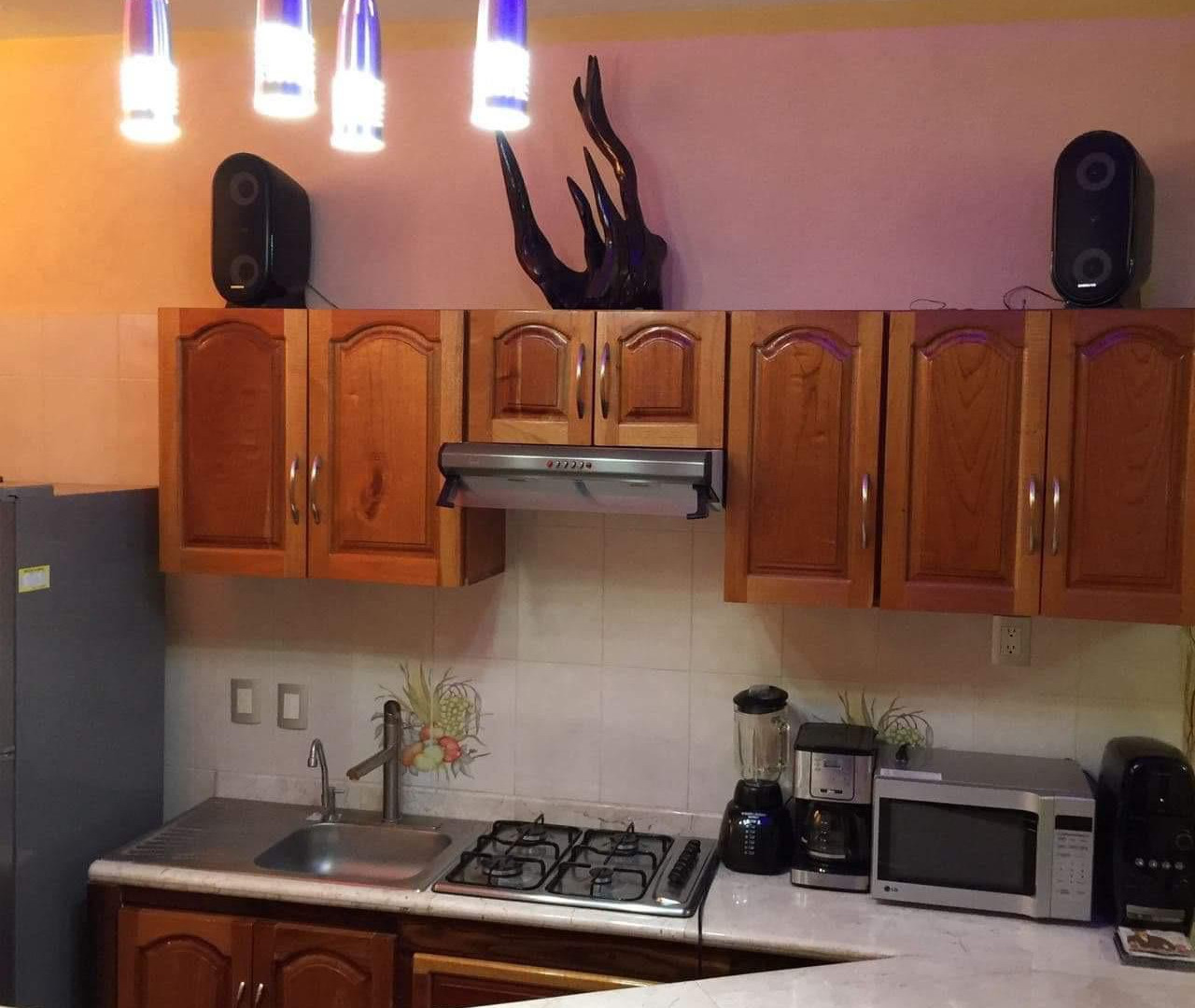 HERMOSA RESIDENCIA ESTILO RÚSTICO-CONTEMPORÁNEO CON LUJOSOS ACABADOS; EXCELENTE PARA DISFRUTARLA CON TU FAMILIA; UBICADA EN EL CENTRO DE ZIHUATANEJO A 5 MINUTOS DE LOS PRINCIPALES CENTROS DE COMERCIO, ZONA BANCARIA Y PLAYAS.
PRIMER PLANTA:
CASA PRINCIPAL CONSTA DE: SALA, COMEDOR, COCINA EQUIPADA, JARDÍN INTERIOR CON VITRALES, 2 BAÑOS, 3 RECÁMARAS TODAS CON AIRE ACONDICIONADO, CLOSETS DE MADERA DE CEDRO.
• RECAMARA PRINCIPAL CON BAÑO, VESTÍBULO Y JACUZZI, CON ACCESO DIRECTO A LA ALBERCA Y SALA DE ESTAR.
• SEGUNDA RECAMARA Y TERCER RECAMARA COMPARTEN BAÑO, TODOS LOS BAÑOS CON CANCELARÍA DE CRISTAL TEMPLADO, ESTUDIO, 1/2 BAÑO DE VISITA, PISOS DE MÁRMOL. GARAJE PARA 2 AUTOS, CISTERNA CON CAPACIDAD DE 25,000 LTS.
• ALBERCA CON BAÑO, VESTIDOR Y CUARTO DE BOMBAS DE FILTRADO,
• CUARTO DE SERVICIO CON ESPACIO PARA LAVADORA Y SECADORA
• CISTERNA CON CAPACIDAD DE 10,000 LTS.
• CÁMARAS DE CIRCUITO CERRADO PARA VÍDEO VIGILANCIA, PERÍMETRO PROTEGIDO, BARDEADO, ENREJADO Y CIRCULADO CON CONCERTINA TIPO BISTURÍ
• PORTÓN DE ACCESO Y PUERTA DE PLACA DE ACERO TIPO BLINDAJE CON APERTURA DE PORTÓN AUTOMATIZADO Y PUERTA CON VIDEO PORTERO Y APERTURA AUTOMÁTICA.
• LOCAL COMERCIAL CON ACCESO DE LA CALLE, EQUIPADO PARA OFICINA CON DIVISIONES DE CRISTAL TEMPLADO E ILUMINACIÓN EN LEDS, AIRE ACONDICIONADO TIPO MINI SPLIT, BAÑO Y ACCESO DE PUERTA DE CRISTAL TEMPLADO AUTOMATIZADO,PISOS DE MÁRMOL CON PARED DE MADERA DE PAROTA.
• SEGUNDA PLANTA: UN DEPARTAMENTO TIPO BUNGALOW, TOTALMENTE CON ENTRADA INDEPENDIENTE CON ACABADOS EN MÁRMOL Y MADERAS PRECIOSAS E ILUMINACIÓN DE LEDS. 2 RECAMARAS CON AIRE ACONDICIONADO TIPO MINI SPLIT Y PANTALLAS LCD CON CABLE; UNA CON CAMA KING SIZE Y LA OTRA CON 2 CAMAS INDIVIDUALES, TODAS CON CLOSETS DE MADERA DE CEDRO. COCINA CON BARRA. SALA DE ESTAR CON SISTEMA DE SONIDO, LUCES LED´S DE AMBIENTACIÓN. JARDÍN CON ESPACIOSA CABAÑA CONSTRUIDA CON MADERAS PRECIOSAS CON ESPACIO PARA 4 HAMACAS.
●CONSTA DE 319.08 MTS 2. DE TERRENO
●CONSTA DE 301.84 MTS 2 DE CONSTRUCCIÓN.
● INCLUYE MOBILIARIO EXCEPTO EL ARTE.
____________________
BEAUTIFUL CONTEMPORARY-RUSTIC STYLE RESIDENCE WITH LUXURY FINISHES; EXCELLENT TO ENJOY WITH YOUR FAMILY; LOCATED IN TOWN OF ZIHUATANEJO, GUERRERO MÉXICO, 5 MINUTES FROM THE MAIN CENTERS OF COMMERCE, BANK AREA AND BEACHES.
FIRST FLOOR:
MAIN HOUSE CONSISTS: LIVING ROOM, DINING ROOM, EQUIPPED KITCHEN, INTERIOR GARDEN WITH VITRALS, 2 BATHROOMS, 3 BEDROOMS ALL WITH AIR CONDITIONING, CEDRO WOOD CLOSETS.
MAIN BEDROOM WITH BATH, DRESSING ROOM AND JACUZZI, WITH DIRECT ACCESS TO THE POOL AND LIVING ROOM.
SECOND BEDROOM AND THIRD BEDROOM SHARE BATHROOM, ALL BATHROOMS WITH TEMPERED GLASS CANCELLATION, STUDY, 1/2 VISIT BATH, MARBLE FLOORS. GARAGE FOR 2 CARS, 1 TANK WITH CAPACITY OF 25,000 LTS
POOL WITH BATHROOM, DRESSING ROOM AND FILTER PUMPS
SERVICE ROOM WITH SPACE FOR WASHING AND DRYER AND TANK WITH CAPACITY OF 10,000 LTS.
CLOSED CIRCUIT CAMERAS FOR VIDEO SURVEILLANCE, PROTECTED PERIMETER, BARRIED AND CRIEDED CIRCULATE WITH SCALPEL TYPE CONCERTINE, ACCESS GATE AND STEEL PLATE DOOR ARMOR TYPE WITH AUTOMATIC AUTOMATED AND DOOR OPENED DOOR OPENING.
COMMERCIAL PREMISES WITH STREET ACCESS, EQUIPPED FOR OFFICE WITH TEMPERED GLASS DIVISIONS AND LIGHTING IN LEDS, MINI SPLIT TYPE AIR CONDITIONING, BATHROOM AND AUTOMATED TEMPERED GLASS DOOR ACCESS, MARBLE FLOORS WITH WOOD WALL.
SECOND FLOOR:
A BUNGALOW TYPE DEPARTMENT, FULLY WITH INDEPENDENT ENTRANCE WITH FINISHES IN MARBLE AND PRECIOUS WOODS AND LED LIGHTING.
2 BEDROOMS WITH AIR CONDITIONING TYPE MINI SPLIT AND LCD SCREENS WITH CABLE; ONE WITH KING SIZE BED AND THE OTHER WITH 2 INDIVIDUAL BEDS, ALL WITH CLOSETS OF WOOD OF CEDAR.
KITCHEN WITH BAR. LIVING ROOM WITH SOUND SYSTEM, LED´S AMBIENTATION LIGHTS. GARDEN WITH SPACIOUS CABIN BUILT WITH PRECIOUS WOODS WITH SPACE FOR 4 HAMMOCKS.
● LAND OF 319.08 MTS 2.
● CONSTRUCTION 301.84 MTS 2
● INCLUDES FURNITURE EXCEPT THE ART.