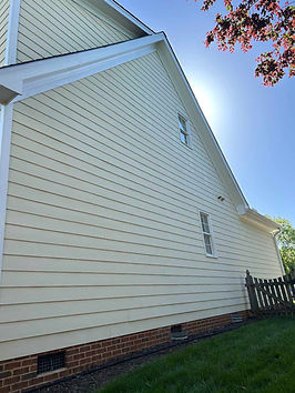 Exterior painting Garner NC restoring faded fascia and trim with fresh white paint in Bainbridge 27529.