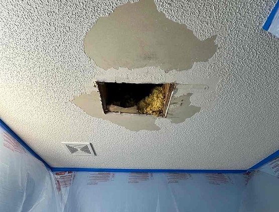 Bathroom ceiling water damage with sheetrock repair before interior painting in Eagle Crossing, Wendell NC.