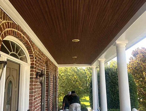 Exterior painting in Wake Forest NC showing stained porch ceiling with clean, finished look in Austin Creek 27587