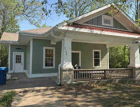 Exterior painting Carrboro NC front view with green siding and white trim renovation in Bolin Forest 27510.