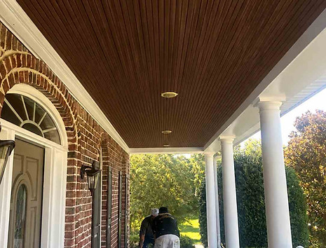 Exterior painting Morrisville NC porch wood ceiling after stain application, restored and protected finish in Breckenridge 27560.