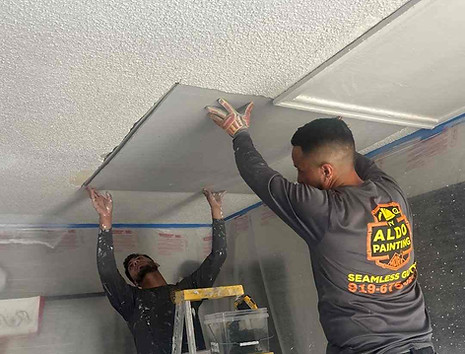Ceiling drywall repair in progress before applying new texture and paint in Colonial Village, Durham NC 27704