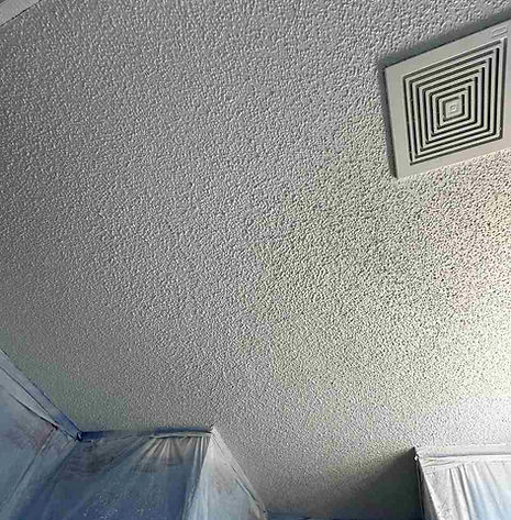 Bathroom ceiling with water damage being repaired before new texture and painting in Eagle Crossing, Wendell