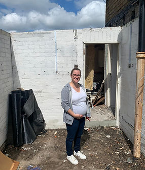 Kim pregnant while renovating.jpeg