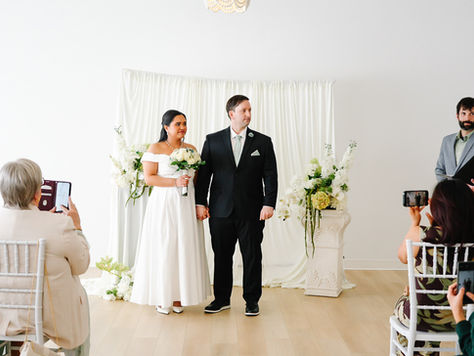 married couple at altar after micro wedding
