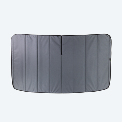 Grey fabric car sunshade, blocking light