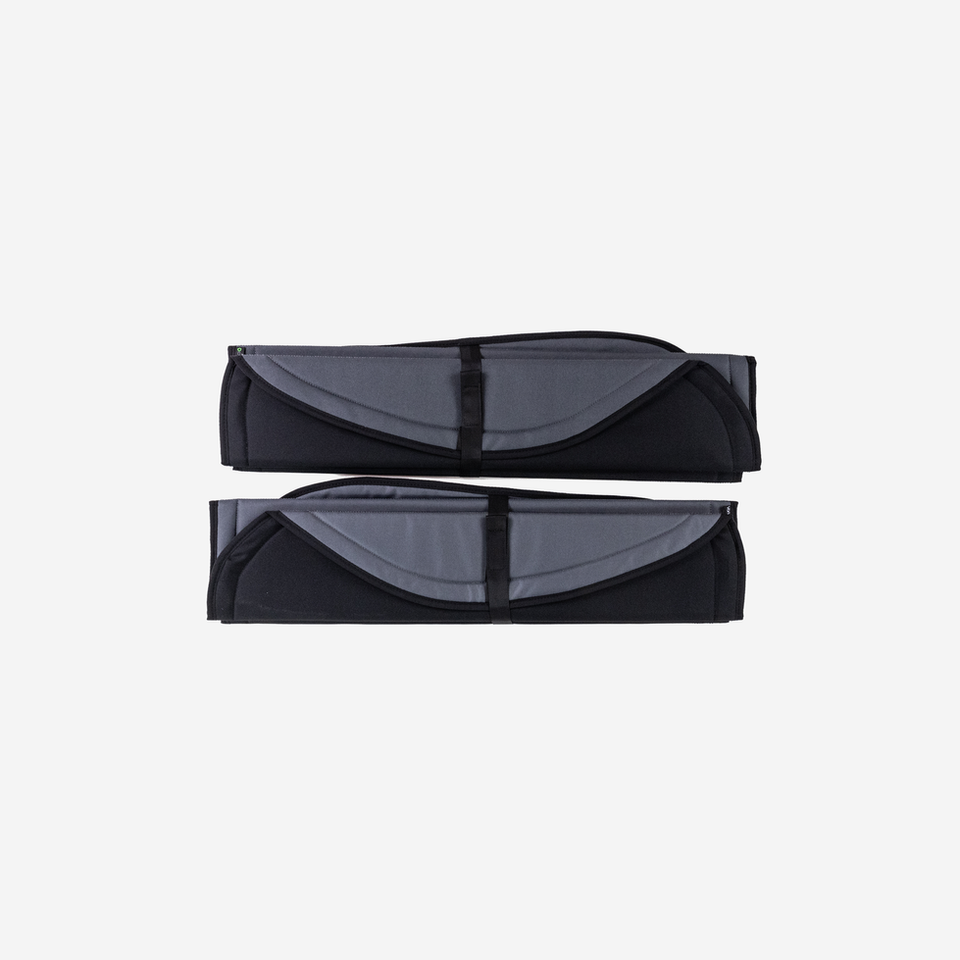 Two gray and black van window covers