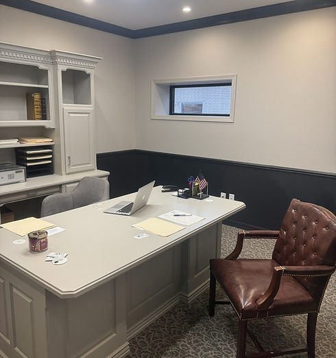Private meeting office at A+ Idaho Bail Bonds in Rexburg, with a desk and client chair