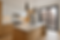 Small Chelsea condo kitchen with tile backsplash and quartz countertops.png