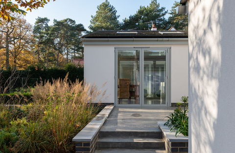 Polished concrete patios to house transformation by Inhabit Architecture, Architects in Hertfordshire.
