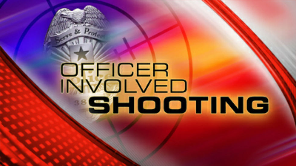 Athens police officer shoots knife wielding man