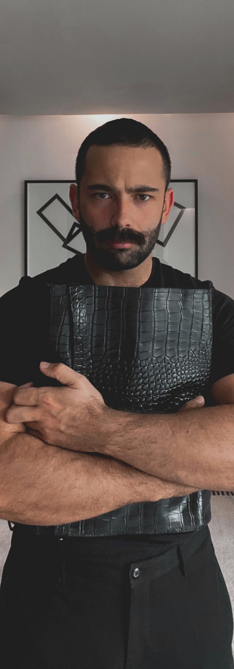 "L'Attaché" is presented as the first piece of leather goods under the brand.