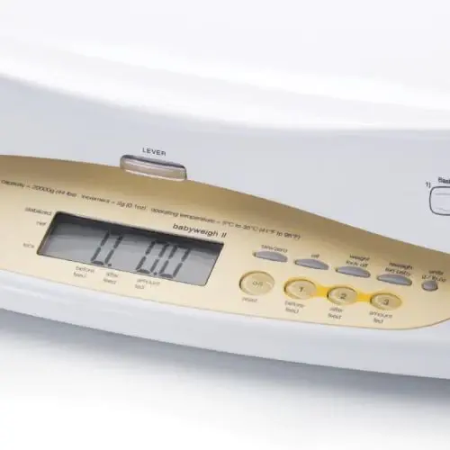 Thumbnail: Digital infant scale displaying 0.00 with gold accents and Medela Infant Scale Rental.