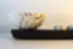 Thumbnail: Inlaid Rocking Bowl and 2 Pebbles on Black Porcelain Plinth