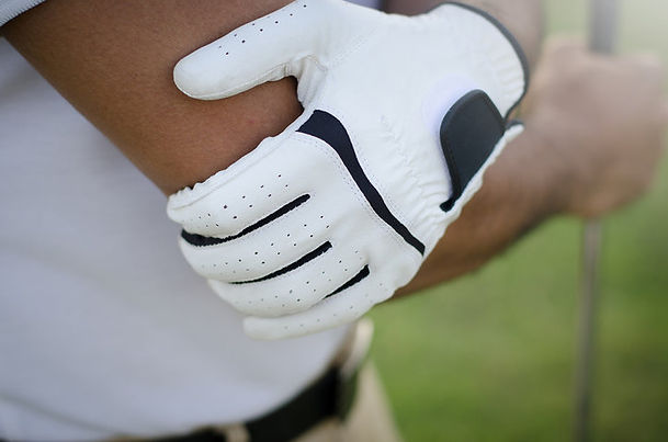 Golfer suffering with Elbow pain