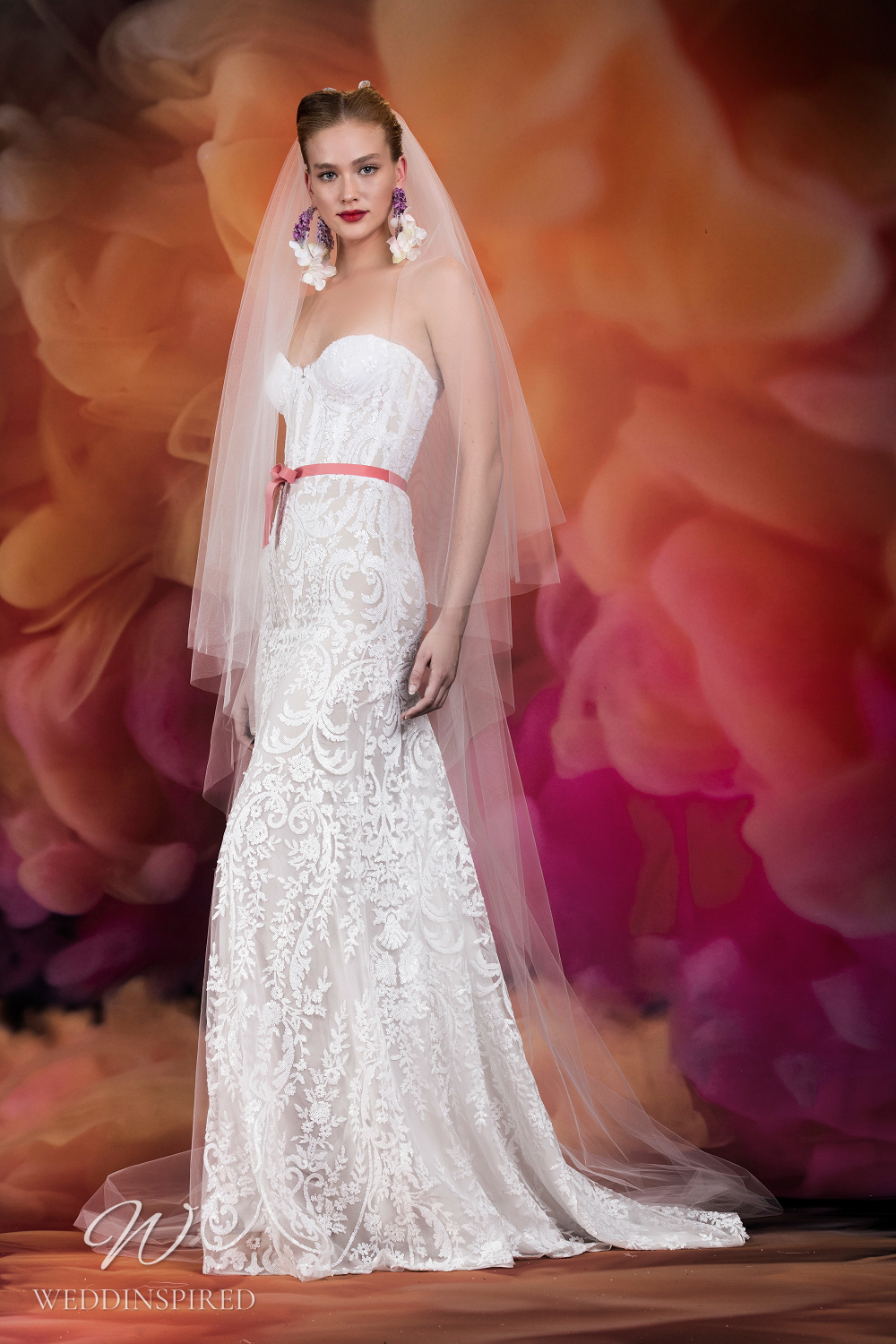 A Naeem Khan lace A-line wedding dress with a sweetheart neckline and bustier top