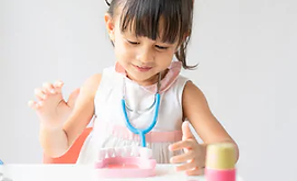 adorable-asian-little-girl-playing-260nw