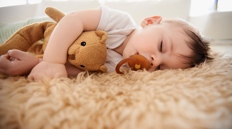 Cropped shot of an adorable baby boy taking a nap