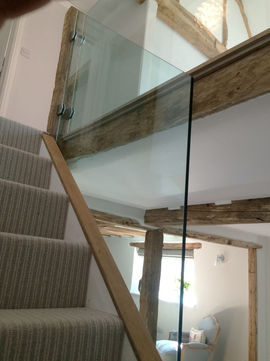 Glass balustrade aside stairs