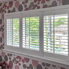 triple shutter with open louvres