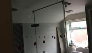 Custom shower screen installation during process