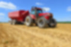Tractor with a tank for transporting grain.jpg