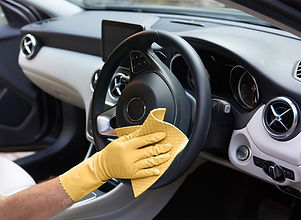 Dealer giving new car thorough clean pri